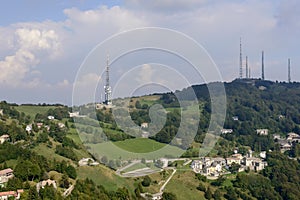 Valcava village and radio antennas on Albenza range, Orobie