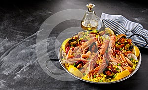 Valencia paella with seafood and shellfish photo