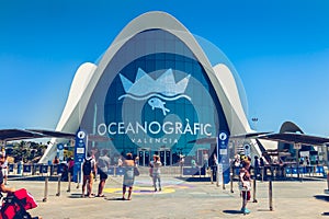 Tourists wait outside the entrance to Oceanografic in Valencia