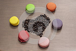Valentain days still life with macaroons and coffee beans photo