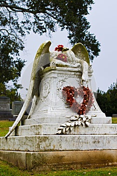 Weeping Angel Monument Colma, California decorated for Valentine's Day with big red heart wreath