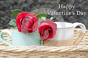 Valentine card with couple cup of coffee with red roses in a rattan wooden basket. Happy Valentine Day