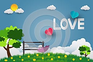 Valentine card day, umbrella with chair in public park bright sky With the letter love