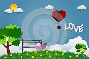 Valentine card day, umbrella with chair in public park bright sky With the letter love