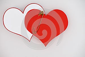 Valentine concept- two pined paper