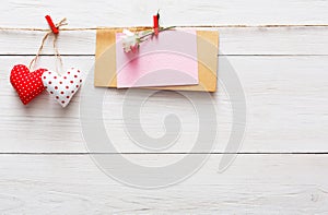 Valentine day background, paper hearts border on wood, copy space
