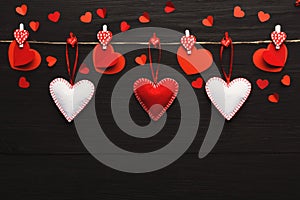 Valentine day background, pillow hearts border on wood, copy space