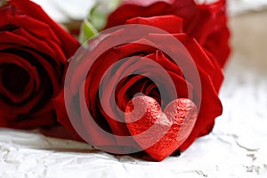 Valentine day background, three red roses and heart