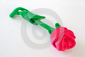 Valentine Day Concept : Fake red rose flower on white background.