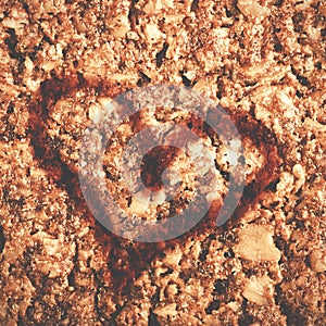 Valentine day concept.Shape of heart draw on healthy Granola bar