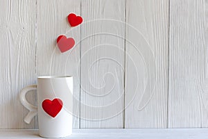 Valentine Day with red cup coffee Sewed pillow hearts row border, wood white background