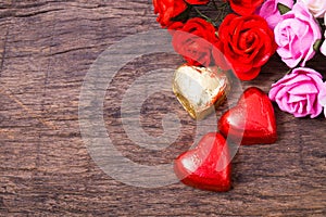 Valentine decoration, heart shaped chocolate and roses