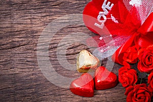 Valentine decoration, heart shaped chocolate, roses, heart and l
