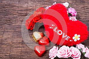 Valentine decoration, heart shaped chocolate, roses, heart and l