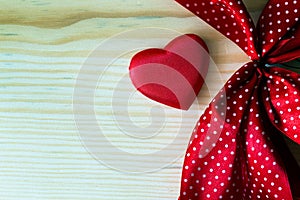 valentine heart with red dotted ribbon