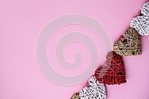 Valentine hearts on pink background with copy space. Symbols of love in shape of heart for Happy Valentine`s , Women`s, Mother`