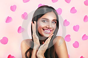 Valentine Hearts sweet makeup. Valentine`s Day make-up lips with pink hearts sugar sprinkles. Kiss on the Lips