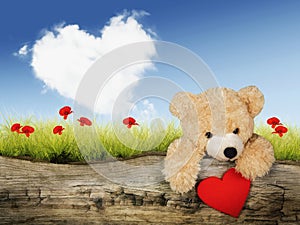 Valentine`s card with teddy bear with heart