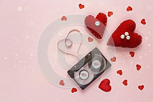 Valentine`s Day background with audio cassette tape in the shape