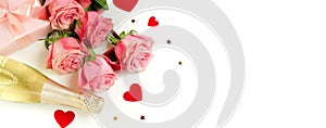Valentine`s day background . Bouquet of pink roses flowers, gift box and champagne bottle isolated