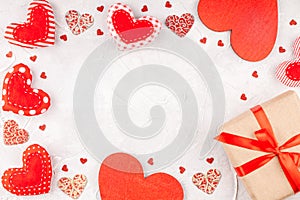 Valentine`s Day Background with Handmade Hearts and Gift Box with Red Ribbon Bow