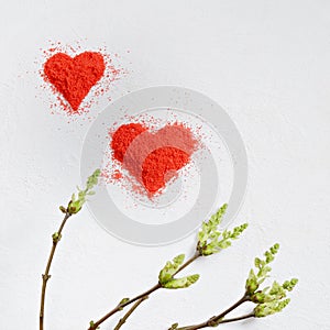 Valentine`s day background. Heart made of red crumbs on a white background. top view. Copy space. Flat lay. Greeting card.