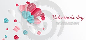 Valentine`s day background. Hearts pink and blue papaer cut card on white background. Decor clouds space for text