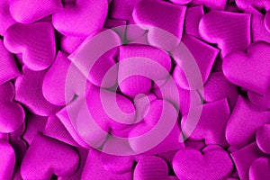 Valentine`s Day Background. Holiday Abstract Valentine Background with purple satin Hearts. Heart Shape Backdrop