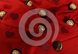 Valentine\'s Day background with red hearts, red roses wine bottle on red, white and black background