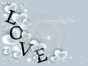 Valentine`s Day background of shinning hearts around Love text with glittering on gray background with your copy space.