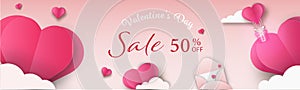 Valentine`s day baner of sale in cut paper style with cloud and hearts on gentle pink romantic background