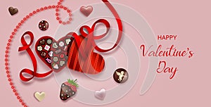 Valentine`s day banner with heart shaped chocolate box, chocolates and ribbon