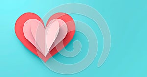 Valentine\'s Day banner of red paper heart over blue background.