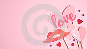 Valentine`s day card template with elegant decorations on pink background with copy space. Flat lay, top view. Happy Valentines