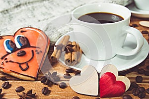 Valentine& x27;s day concept . Cup of coffee and two heart on wooden