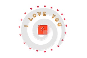 Valentine`s day concept. Declaration of love, frame made of paper hearts. In the center red gift box with ring. Flat lay, top view