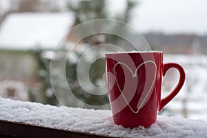 Valentine`s day concept with hearts and cups over nature
