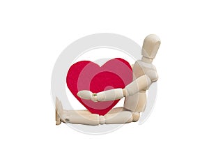 Valentine`s day concept. Wooden dummy hug a heart shape that made from acrylic felt fabric