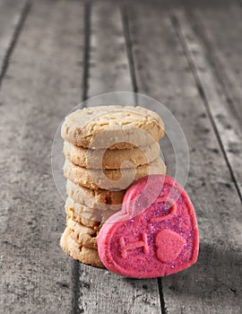 Valentine's day cookie on a wooden bench