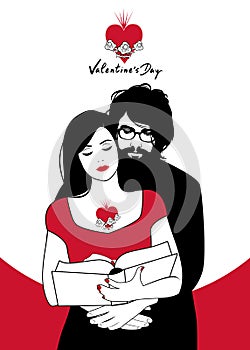 Valentine`s Day. Couple reading hugged. photo
