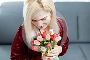 Valentine's Day, Dreaming Young Woman with Bouquet of Flowers