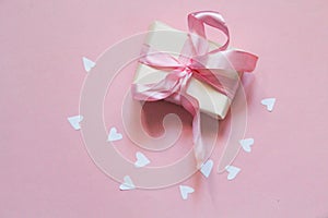 Valentine`s Day. Gifts, hearts on pink background. Flat lay, top view, copy space