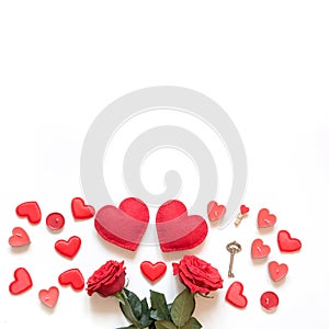 Valentine`s day greeting card. Composition with roses, red hearts. Top view. Copy space