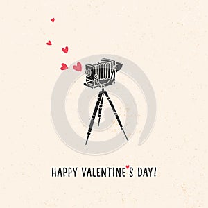 Valentine's day greeting card with old vintage camera, hearts