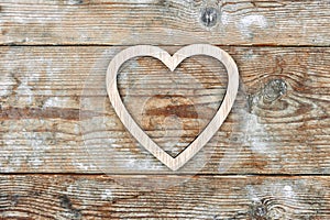 Valentine`s Day. heart on old wooden background