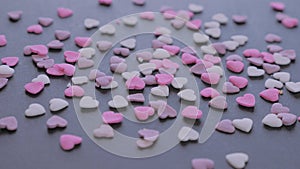 Valentine`s Day heart shaped candy on black background