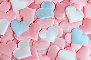 Valentine`s Day Hearts Background. Holiday Abstract Valentine Background with pink, white and blue pastel color satin Hearts