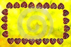 Valentine`s day hearts frame, lights background bokeh. Frame for holiday pictures or important text, colored lights in the frame