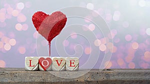 Valentine`s Day Love Wedding Birthday background banner greeting card - Red balloon heart and wooden cubes with heart symbol on