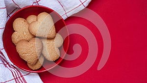 Valentine`s Day and Mother`s Day banner concept.Pattern of traditional homemade cookies, lots of heart shaped shortbread cookies